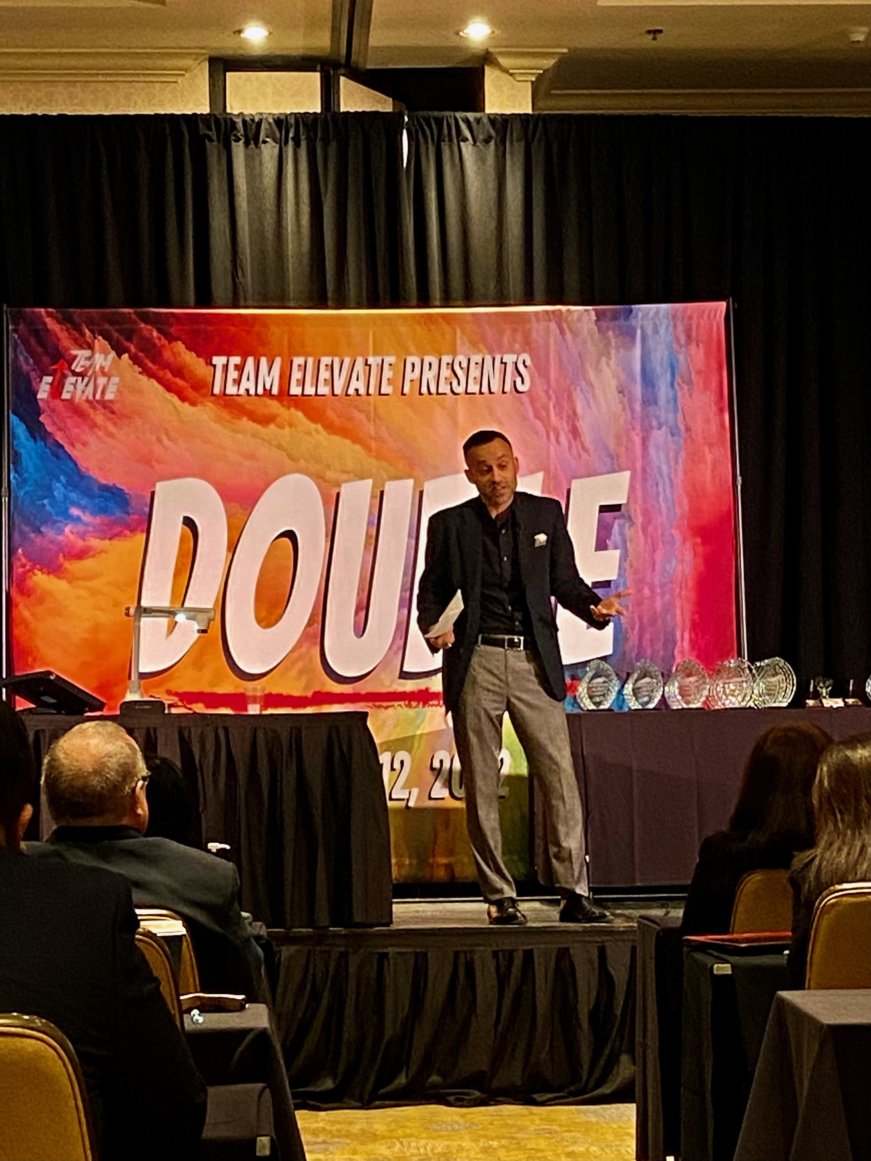 Robert Roman speaking at an event